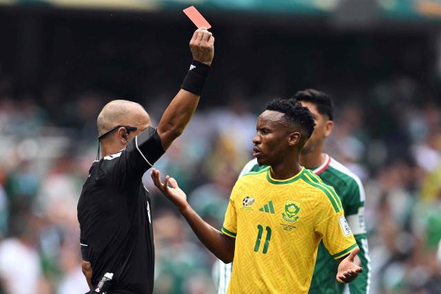 Brazilian referee Wilton Sampaio shows a red card to South Africa's midfielder #11 Themba Zwane during the 2026 World Cup Group A football match between Mexico and South Africa at the Mexico City Stadium in Mexico City on June 11, 2026. (Photo by Yuri CORTEZ / AFP)