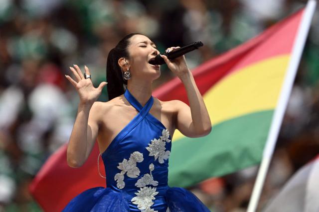 South Korean–American singer, songwriter, and record producer Ejae performs during the opening ceremony ahead of the 2026 World Cup Group A football match between Mexico and South Africa at the Mexico City Stadium in Mexico City on June 11, 2026. (Photo by CARL DE SOUZA / AFP)