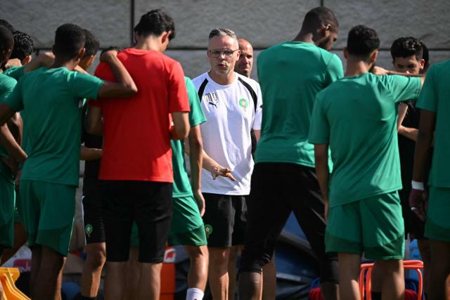 Morocco's head coach Mohamed Ouahbi speaks to his players during a training session for the 2026 World Cup football tournament at the Pingry School in Basking Ridge, New Jersey, on June 11, 2026. (Photo by MAURO PIMENTEL / AFP)
