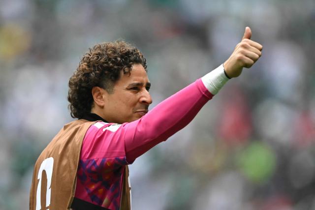 Mexico's goalkeeper #13 Guillermo Ochoa gestures during the warm-up ahead of the 2026 World Cup Group A football match between Mexico and South Africa at the Mexico City Stadium in Mexico City on June 11, 2026. (Photo by CARL DE SOUZA / AFP)