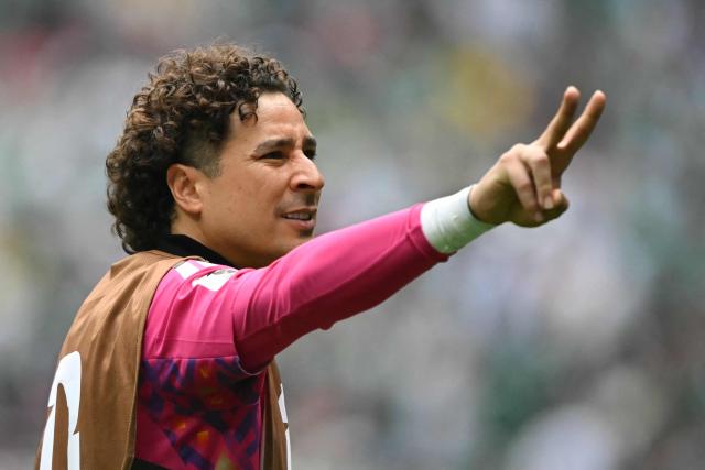 Mexico's goalkeeper #13 Guillermo Ochoa gestures during the warm-up ahead of the 2026 World Cup Group A football match between Mexico and South Africa at the Mexico City Stadium in Mexico City on June 11, 2026. (Photo by CARL DE SOUZA / AFP)