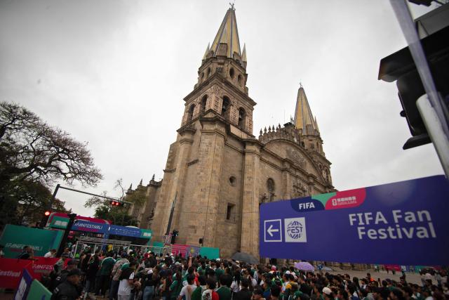 People gather at the FIFA Fan Festival Guadalajara at Plaza de la Liberacion and Plaza de Armas in Guadalajara, Jalisco state, Mexico, on June 11, 2026 during the opening of the FIFA World Cup 2026. (Photo by RUTH ROSAS / AFP)