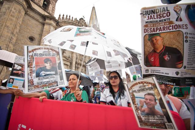 Relatives of missing persons and members of search collectives protest during the opening of the FIFA World Cup 2026 in downtown Guadalajara, Jalisco state, Mexico, on June 11, 2026. (Photo by RUTH ROSAS / AFP)