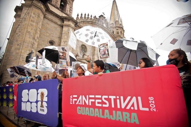 Relatives of missing persons and members of search collectives protest during the opening of the FIFA World Cup 2026 in downtown Guadalajara, Jalisco state, Mexico, on June 11, 2026. (Photo by RUTH ROSAS / AFP)