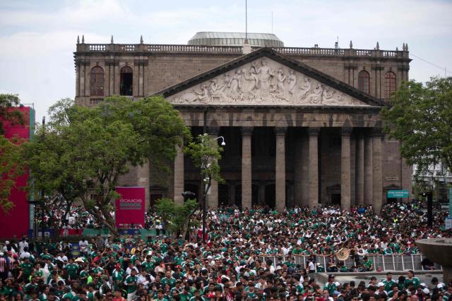 People gather at the FIFA Fan Festival Guadalajara at Plaza de la Liberacion and Plaza de Armas in Guadalajara, Jalisco state, Mexico, on June 11, 2026 during the opening of the FIFA World Cup 2026. (Photo by RUTH ROSAS / AFP)