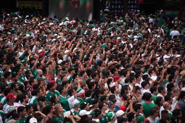 People gather at the FIFA Fan Festival Guadalajara at Plaza de la Liberacion and Plaza de Armas in Guadalajara, Jalisco state, Mexico, on June 11, 2026 during the opening of the FIFA World Cup 2026. (Photo by RUTH ROSAS / AFP)