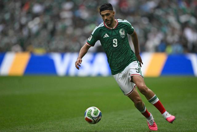 Mexico's forward #09 Raul Jimenez runs with the ball during the 2026 World Cup Group A football match between Mexico and South Africa at the Mexico City Stadium in Mexico City on June 11, 2026. (Photo by CARL DE SOUZA / AFP)