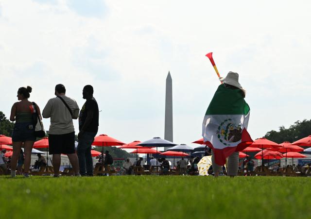 Fans gather during a watch party for the opening match of the 2026 World Cup football tournament between Mexico and South Africa on the National Mall in Washington, DC, on June 11, 2026. (Photo by Alex WROBLEWSKI / AFP)