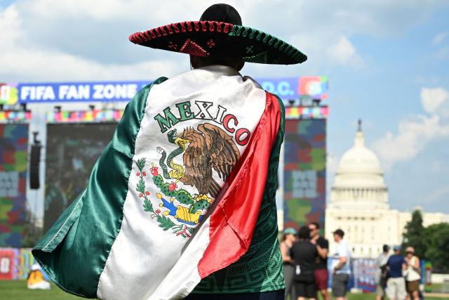 Fans gather during a watch party for the opening match of the 2026 World Cup football tournament between Mexico and South Africa on the National Mall in Washington, DC, on June 11, 2026. (Photo by Alex WROBLEWSKI / AFP)