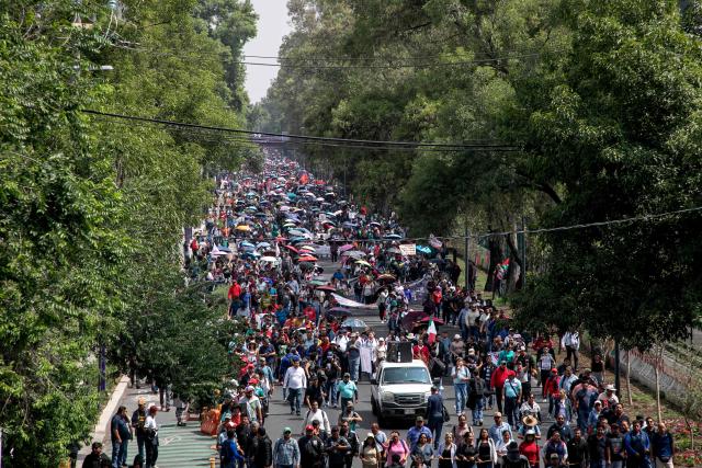 Teachers march during a demonstration by the National Coordination of Education Workers (CNTE) in Mexico City on June 11, 2026, the day of the FIFA World Cup kick off. (Photo by Oswaldo Ramirez / AFP)