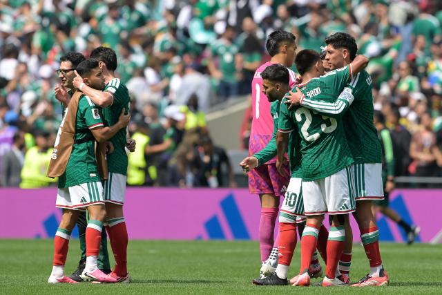 Mexico's players celebrate at the end of the 2026 World Cup Group A football match between Mexico and South Africa at the Mexico City Stadium in Mexico City on June 11, 2026. (Photo by Alfredo ESTRELLA / AFP)
