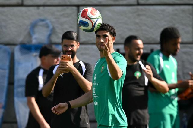 Morocco's defender Achraf Hakimi grabs the ball during a training session for the 2026 World Cup football tournament at the Pingry School in Basking Ridge, New Jersey, on June 11, 2026. (Photo by MAURO PIMENTEL / AFP)