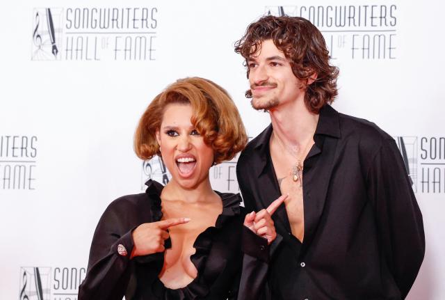 British singer songwriter Raye and US producer songwriter Mike Sabath attend the 55th Annual Songwriters Hall of Fame Induction and Awards Gala at the Marriott Marquis Hotel in New York on June 11, 2026. (Photo by kena betancur / AFP)