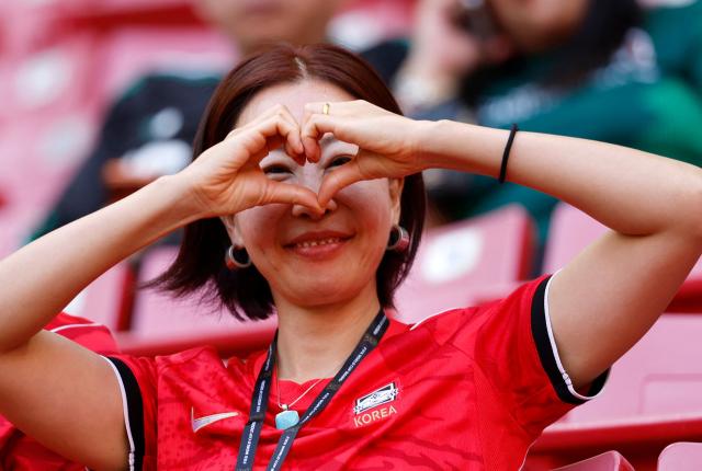 A fan of South Korea gestures on ahead of the 2026 World Cup Group A football match between South Korea and the Czech Republic at the Guadalajara Stadium in Zapopan on June 11, 2026. (Photo by Ulises RUIZ / AFP)