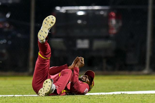 Roston Chase of West Indies takes the catch to dismiss unseen Kusal Mendis of Sri Lanka during the first Twenty20 (T20) international cricket match between West Indies and Sri Lanka at Sabina Park in Kingston, Jamaica, on June 11, 2026. (Photo by Randy Brooks / AFP)