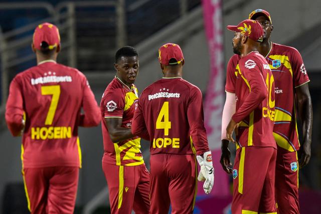 Shamar Joseph (2L) of West Indies celebrates the dismissal of unseen Kusal Mendis of Sri Lanka during the first Twenty20 (T20) international cricket match between West Indies and Sri Lanka at Sabina Park in Kingston, Jamaica, on June 11, 2026. (Photo by Randy Brooks / AFP)