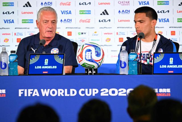 Paraguay's Argentine head coach Gustavo Alfaro (L) and midfielder Diego Gomez (R) give a press conference at Los Angeles Stadium in Inglewood on June 11, 2026, on the eve of the 2026 World Cup football match between USA and Paraguay. (Photo by Patrick T. Fallon / AFP)