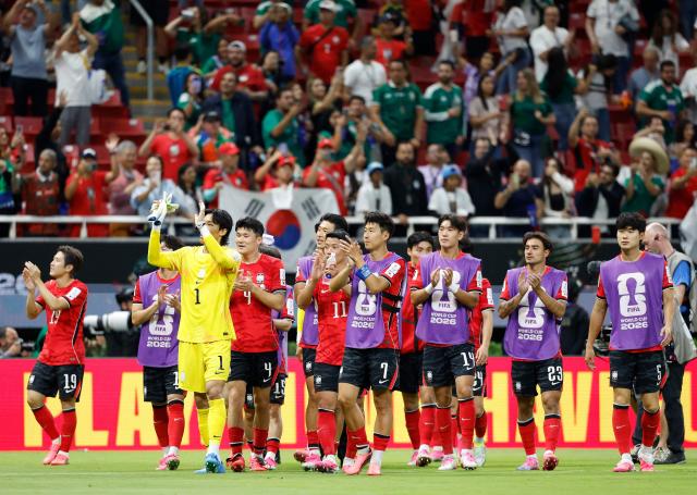 South Korea's players celebrate after winning the 2026 World Cup Group A football match between South Korea and the Czech Republic at the Guadalajara Stadium in Zapopan on June 11, 2026. (Photo by Ulises RUIZ / AFP)