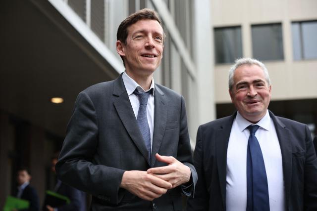 France's Education Minister Edouard Geffray (L) is welcomed by headmaster Damien Doucet (R) as he arrives to pay a visit to students during their mathematics exam as part of the baccalaureate at the Gabriel Faure school and middle school in Paris on June 12, 2026. (Photo by SIMON WOHLFAHRT / AFP)