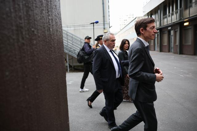France's Education Minister Edouard Geffray (R) is welcomed by headmaster Damien Doucet (C) as he arrives to pay a visit to students during their mathematics exam as part of the baccalaureate at the Gabriel Faure school and middle school in Paris on June 12, 2026. (Photo by SIMON WOHLFAHRT / AFP)