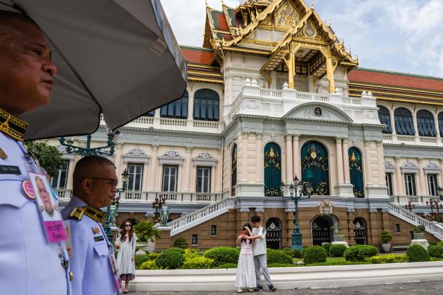 People visit the Grand Palace complex in Bangkok on June 12, 2026. Thai Princess Bajrakitiyabha Mahidol, the king's eldest daughter, has died aged 47, the royal palace announced on June 12, more than three years after she was hospitalised following a sudden illness. (Photo by ANTHONY WALLACE / AFP)