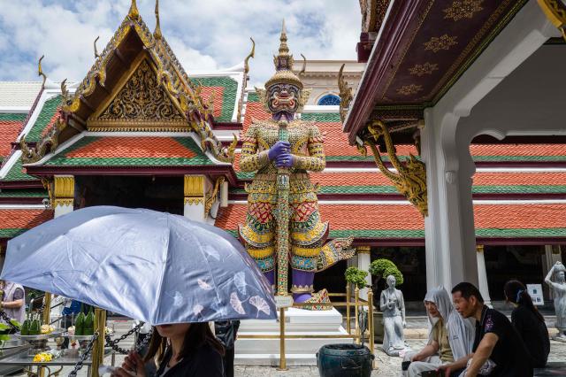 People visit the Grand Palace complex in Bangkok on June 12, 2026. Thai Princess Bajrakitiyabha Mahidol, the king's eldest daughter, has died aged 47, the royal palace announced on June 12, more than three years after she was hospitalised following a sudden illness. (Photo by ANTHONY WALLACE / AFP)