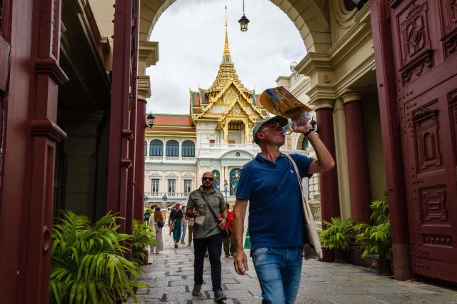 People visit the Grand Palace complex in Bangkok on June 12, 2026. Thai Princess Bajrakitiyabha Mahidol, the king's eldest daughter, has died aged 47, the royal palace announced on June 12, more than three years after she was hospitalised following a sudden illness. (Photo by ANTHONY WALLACE / AFP)