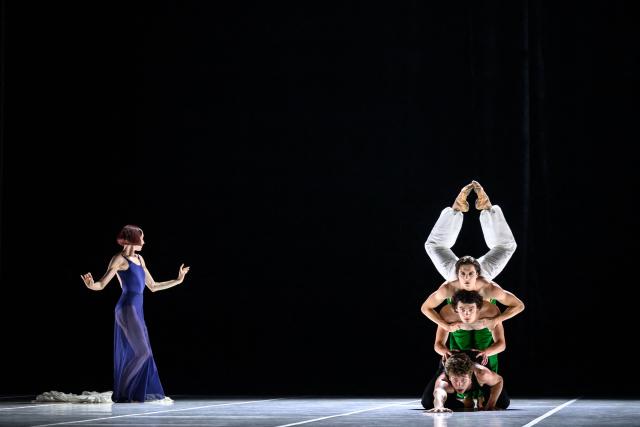Dancers of the Bejart Ballet Lausanne perform "La Route de la soie" (The Silk Road) a major choreographic work imagined by Maurice Bejart, inspired by the spirit of travel and cultural exchange across Asia, during a dress rehearsal at the Theatre de Beaulieu in Lausanne, June 10, 2026. The show runs until June 14, 2026. (Photo by Fabrice COFFRINI / AFP)