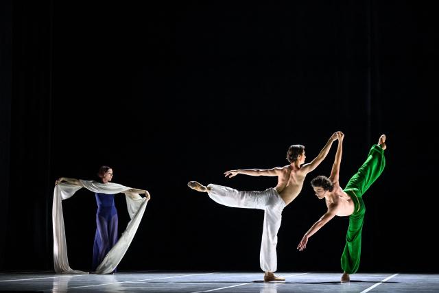 Dancers of the Bejart Ballet Lausanne perform "La Route de la soie" (The Silk Road) a major choreographic work imagined by Maurice Bejart, inspired by the spirit of travel and cultural exchange across Asia, during a dress rehearsal at the Theatre de Beaulieu in Lausanne, June 10, 2026. The show runs until June 14, 2026. (Photo by Fabrice COFFRINI / AFP)