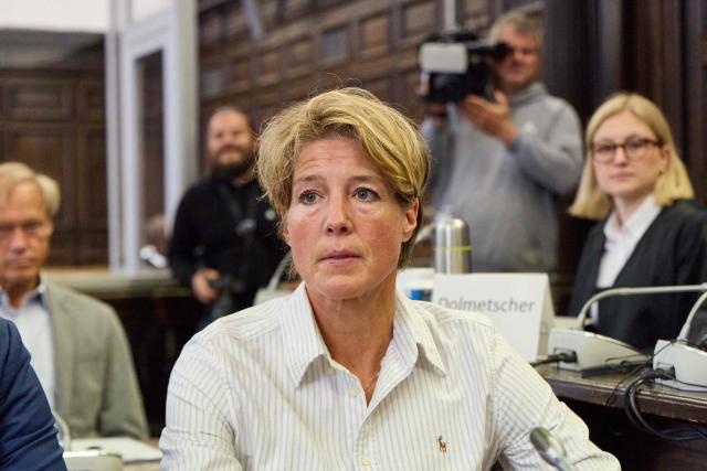 Defendant German entrepreneur and gastronome Christina Block arrives for the continuation of the trial over alleged child abduction at the Criminal Court building in Hamburg, northern Germany, on June 12, 2026. The public prosecutor's office accuses Block, heiress of a steakhouse chain, of ordering the abduction of her daughter, born in 2010, and her son, born in 2013. According to the indictment, the background to this is an escalating custody dispute over many years between Block and her former husband, who have four children together. (Photo by Georg Wendt / POOL / AFP)