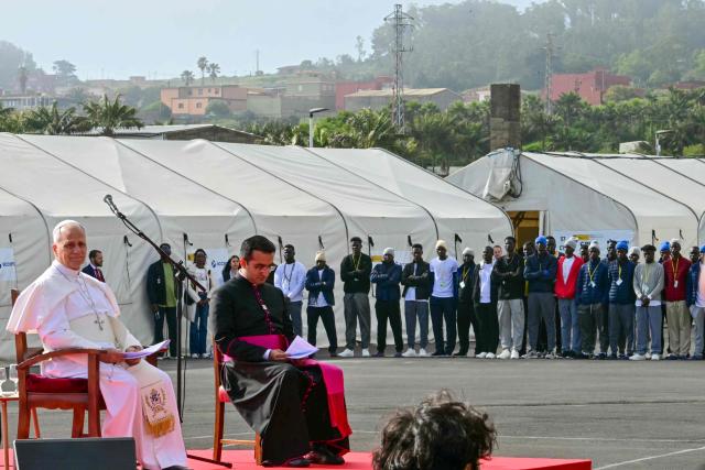 Pope Leo XIV meets with migrants at the “Las Raices" (The Roots) centre in San Cristobal de la Laguna, outside Santa Cruz de Tenerife on the Canary Island of Tenerife on June 12, 2026. Pope Leo XIV is on the final day of a seven-day trip to Spain, including Barcelona and the islands of Gran Canaria and Tenerife where he will meet with migrants and organisations dedicated to helping them. (Photo by Stefano RELLANDINI / AFP)