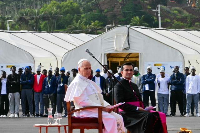 Pope Leo XIV meets with migrants at the “Las Raices" (The Roots) centre in San Cristobal de la Laguna, outside Santa Cruz de Tenerife on the Canary Island of Tenerife on June 12, 2026. Pope Leo XIV is on the final day of a seven-day trip to Spain, including Barcelona and the islands of Gran Canaria and Tenerife where he will meet with migrants and organisations dedicated to helping them. (Photo by Stefano RELLANDINI / AFP)