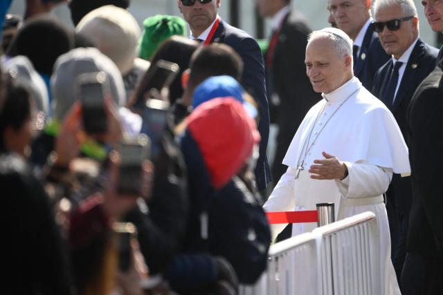 Pope Leo XIV meets with migrants at the “Las Raices" (The Roots) centre in San Cristobal de la Laguna, outside Santa Cruz de Tenerife on the Canary Island of Tenerife on June 12, 2026. Pope Leo XIV is on the final day of a seven-day trip to Spain, including Barcelona and the islands of Gran Canaria and Tenerife where he will meet with migrants and organisations dedicated to helping them. (Photo by Miguel RIOPA / AFP)