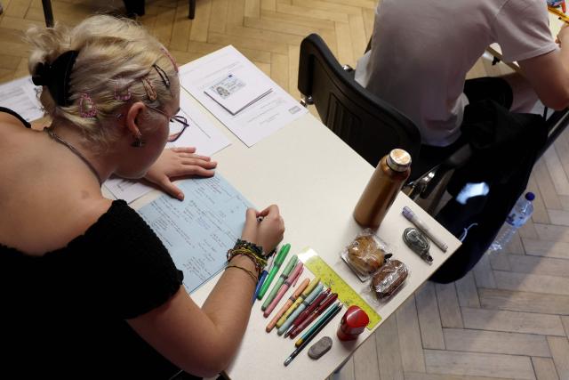 (FILES) Students begin work at the start of the philosophy test as part of the baccalaureat exams, the first test session of the 2024 baccalaureate (high school graduation exam) at the Fustel de Coulanges high school in Strasbourg, eastern France, on June 18, 2024. More than 700,000 candidates across France take the 2026 session of the Baccalaureat or "bac", the secondary school diploma required for access to higher education, with written exams running from June 15 to 18 and oral examinations through early July. (Photo by Frederick FLORIN / AFP)
