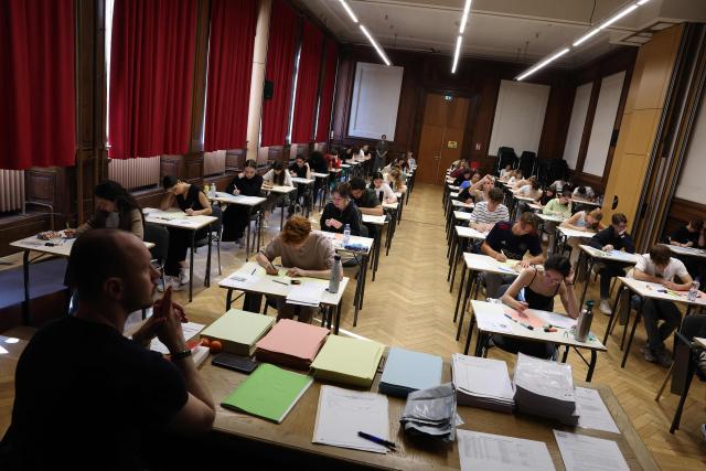 (FILES) Students begin work at the start of the philosophy test as part of the baccalaureat exams, the first test session of the 2024 baccalaureate (high school graduation exam) at the Fustel de Coulanges high school in Strasbourg, eastern France, on June 18, 2024. More than 700,000 candidates across France take the 2026 session of the Baccalaureat or "bac", the secondary school diploma required for access to higher education, with written exams running from June 15 to 18 and oral examinations through early July. (Photo by Frederick FLORIN / AFP)