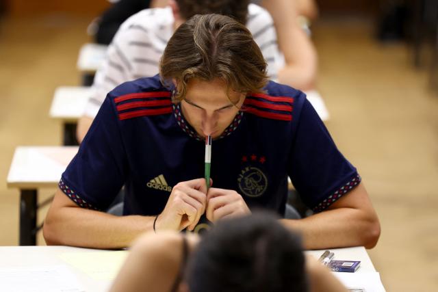 (FILES) Students take the philosophy test as part of the baccalaureat exams, the first test session of the 2024 baccalaureate (high school graduation exam) at the Fustel de Coulanges high school in Strasbourg, eastern France, on June 18, 2024. More than 700,000 candidates across France take the 2026 session of the Baccalaureat or "bac", the secondary school diploma required for access to higher education, with written exams running from June 15 to 18 and oral examinations through early July. (Photo by Frederick FLORIN / AFP)