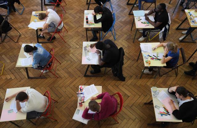 (FILES) High school students take the philosophy exam, the first test session of the 2019 baccalaureate (high school graduation exam) on June 17, 2019 at the Pasteur high school in Strasbourg, eastern France. More than 700,000 candidates across France take the 2026 session of the Baccalaureat or "bac", the secondary school diploma required for access to higher education, with written exams running from June 15 to 18 and oral examinations through early July. (Photo by Frederick FLORIN / AFP)