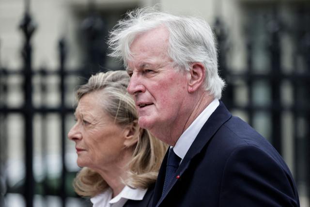 Droite Republicaine's MP Michel Barnier (R) arrives to attend the funeral ceremony for late Bernadette Chirac, widow of former French president Jacques Chirac at the Basilica Sainte-Clotilde, in Paris on June 12, 2026. Bernadette Chirac passed away at 93 years old on June 5. She stood by her late husband, former French president Jacques Chirac, during 12 years as first lady, but also forged her own, more discreet, political career. (Photo by STEPHANE DE SAKUTIN / AFP)