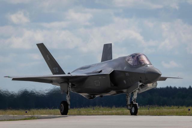 One of the three US-made F-35 aircraft (Polish codename Husarz) in the Polish Air Force taxis along the runway at the 32nd Tactical Air Base in Lask, central Poland, on June 12, 2026, on the day of their official entry into service with the Polish Air Force. (Photo by Wojtek RADWANSKI / AFP)