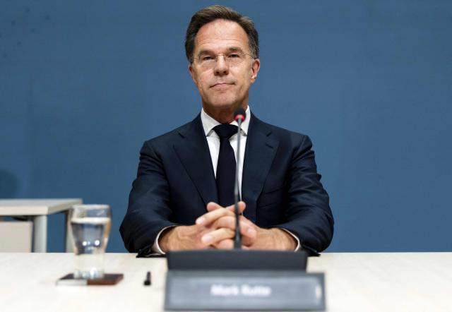 NATO Secretary General and former Netherland's Prime Minister Mark Rutte attends a public hearing of the parliamentary inquiry committee into the government's coronavirus policy, in The Hague on June 12, 2026. Rutte served as Prime Minister during the coronavirus pandemic. (Photo by Remko de Waal / ANP / AFP) / Netherlands OUT