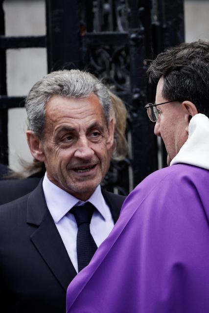 France's former president Nicolas Sarkozy  arrives to attend the funeral ceremony for late Bernadette Chirac, widow of former French president Jacques Chirac at the Basilica Sainte-Clotilde, in Paris on June 12, 2026. Bernadette Chirac passed away at 93 years old on June 5. She stood by her late husband, former French president Jacques Chirac, during 12 years as first lady, but also forged her own, more discreet, political career. (Photo by STEPHANE DE SAKUTIN / AFP)