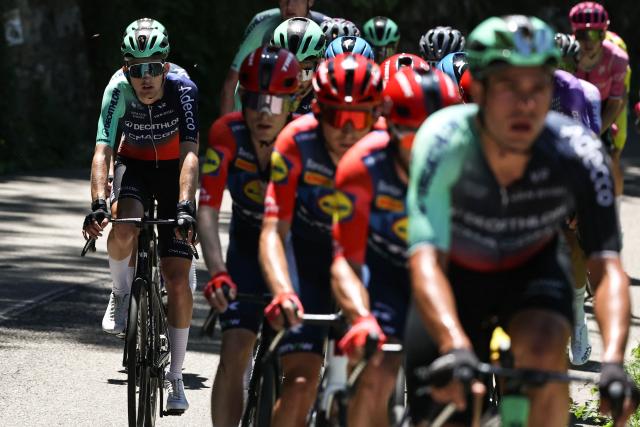 Decathlon CMA CGM Team's French rider Paul Seixas cycles with the pack of riders (peloton) during the 6th stage of the Tour Auvergne-Rhone-Alpes cycling race (formerly known as the Criterium du Dauphine), 182,3km between Saint-Vulbas and Crest-Voland in the French Alps on June 12, 2026. (Photo by Anne-Christine POUJOULAT / AFP)