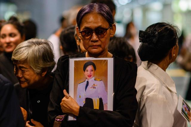 Mourners hold photos of Thai Princess Bajrakitiyabha Mahidol inside Chulalongkorn Hospital in Bangkok on June 12, 2026. Thai Princess Bajrakitiyabha Mahidol, the king's eldest daughter, has died aged 47, the royal palace announced on June 12, more than three years after she was hospitalised following a sudden illness. (Photo by ANTHONY WALLACE / AFP)