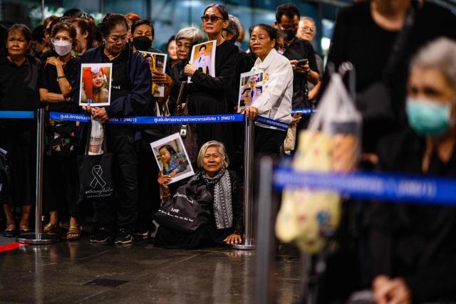 Mourners hold photos of Thai Princess Bajrakitiyabha Mahidol inside Chulalongkorn Hospital in Bangkok on June 12, 2026. Thai Princess Bajrakitiyabha Mahidol, the king's eldest daughter, has died aged 47, the royal palace announced on June 12, more than three years after she was hospitalised following a sudden illness. (Photo by ANTHONY WALLACE / AFP)