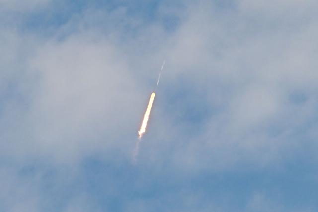A SpaceX Falcon 9 rocket carrying the Starlink 10-54 mission lifts off from Space Launch Complex 40 at Cape Canaveral Space Force Station in Cape Canaveral, Florida, on June 12, 2026. Elon Musk's SpaceX begins trading on the Nasdaq exchange on Friday with the biggest initial public offering in history expected to make the polarizing entrepreneur the world's first trillionaire. The company priced more than 555 million shares at $135 each in a filing with the US markets regulator on Thursday, placing SpaceX in the top 10 of Wall Street's biggest companies with a valuation of just under $1.8 trillion -- ahead of Tesla, Facebook-owner Meta and Walmart. (Photo by CHANDAN KHANNA / AFP)