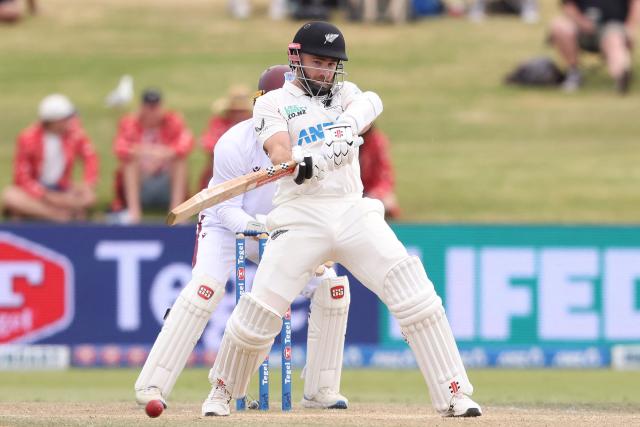 (FILES) New Zealand’s Kane Williamson bats during day four of the 3rd international Test cricket match between New Zealand and West Indies at Bay Oval in Mount Maunganui on December 21, 2025. New Zealand's most prolific run-scorer and arguably greatest batsman Kane Williamson announced his immediate retirement from international cricket on June 12, 2026, in the middle of their series against England. (Photo by Michael Bradley / AFP)
