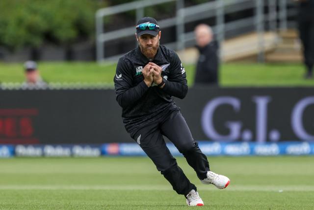(FILES) New Zealand's Kane Williamson takes a catch during the second one-day international (ODI) cricket match between New Zealand and England at Seddon Park in Hamilton on October 29, 2025. New Zealand's most prolific run-scorer and arguably greatest batsman Kane Williamson announced his immediate retirement from international cricket on June 12, 2026, in the middle of their series against England. (Photo by DJ MILLS / AFP)