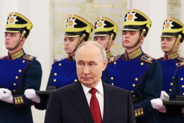In this pool photograph distributed by the Russian state agency Sputnik, Russia's President Vladimir Putin attends the ceremony for the presentation of the 2025 State Prizes in Science and Technology, Literature and the Arts, and for Outstanding Achievements in Human Rights, Humanitarian, and Charitable Activities, as well as the awarding of the Gold Medals of Hero of Labour of the Russian Federation in Moscow on June 12, 2026. (Photo by Alexander KAZAKOV / POOL / AFP)