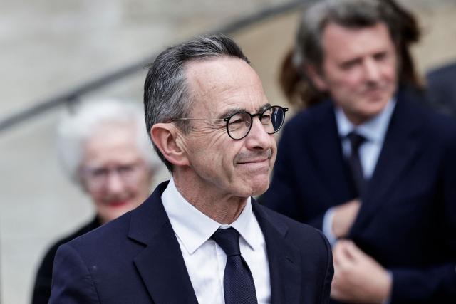 The president of French right-wing party Les Republicains (LR) and 2027 presidential election candidate Bruno Retailleau leaves at the end of the funeral ceremony for late Bernadette Chirac, widow of former French president Jacques Chirac at the Basilica Sainte-Clotilde, in Paris on June 12, 2026. Bernadette Chirac passed away at 93 years old on June 5. She stood by her late husband, former French president Jacques Chirac, during 12 years as first lady, but also forged her own, more discreet, political career. (Photo by STEPHANE DE SAKUTIN / AFP)
