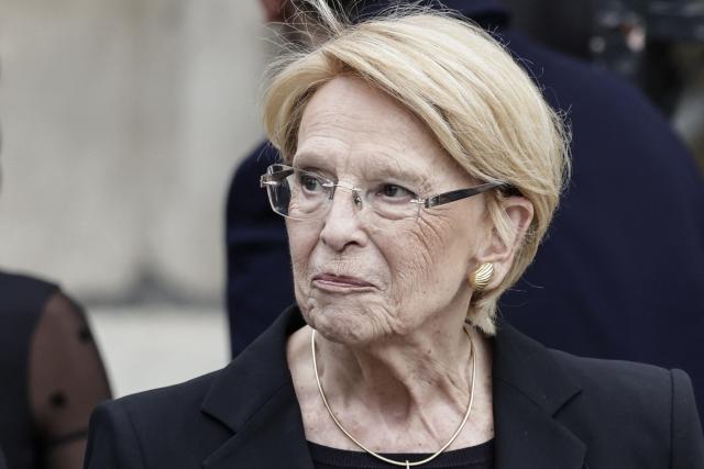 French politician Michele Alliot-Marie leaves at the end of the funeral ceremony for late Bernadette Chirac, widow of former French president Jacques Chirac at the Basilica Sainte-Clotilde, in Paris on June 12, 2026. Bernadette Chirac passed away at 93 years old on June 5. She stood by her late husband, former French president Jacques Chirac, during 12 years as first lady, but also forged her own, more discreet, political career. (Photo by STEPHANE DE SAKUTIN / AFP)